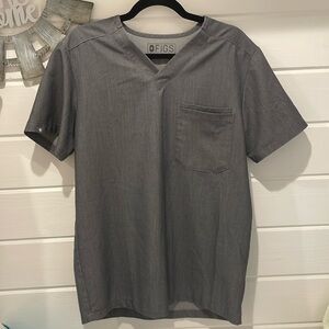 Men’s graphite figs scrub top. Size small.